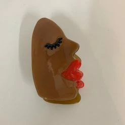 Anorak Brown Face Claw Clip Hair Accessory